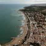 Explore the stunning Mediterranean coastline of Sitges, a picturesque seaside town in Spain.